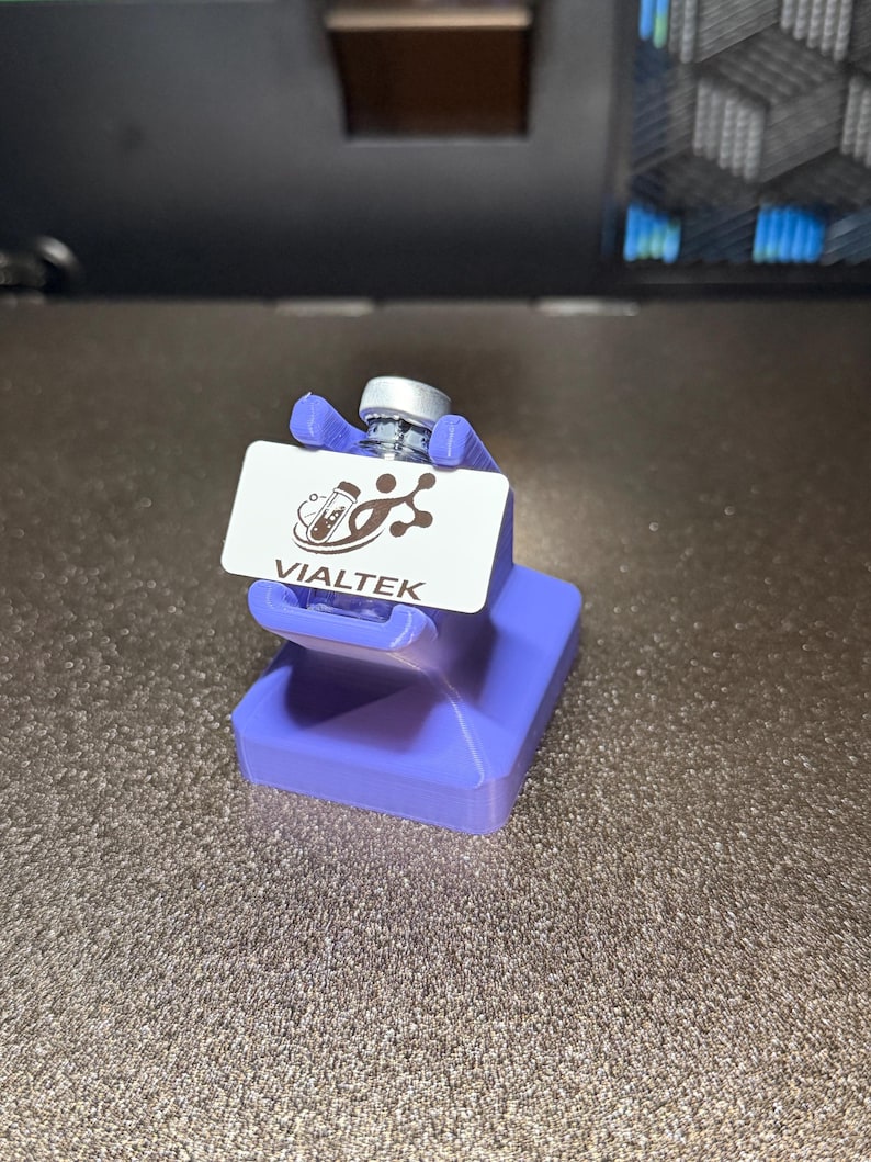 Purple VIALTEK labeling station on a workbench